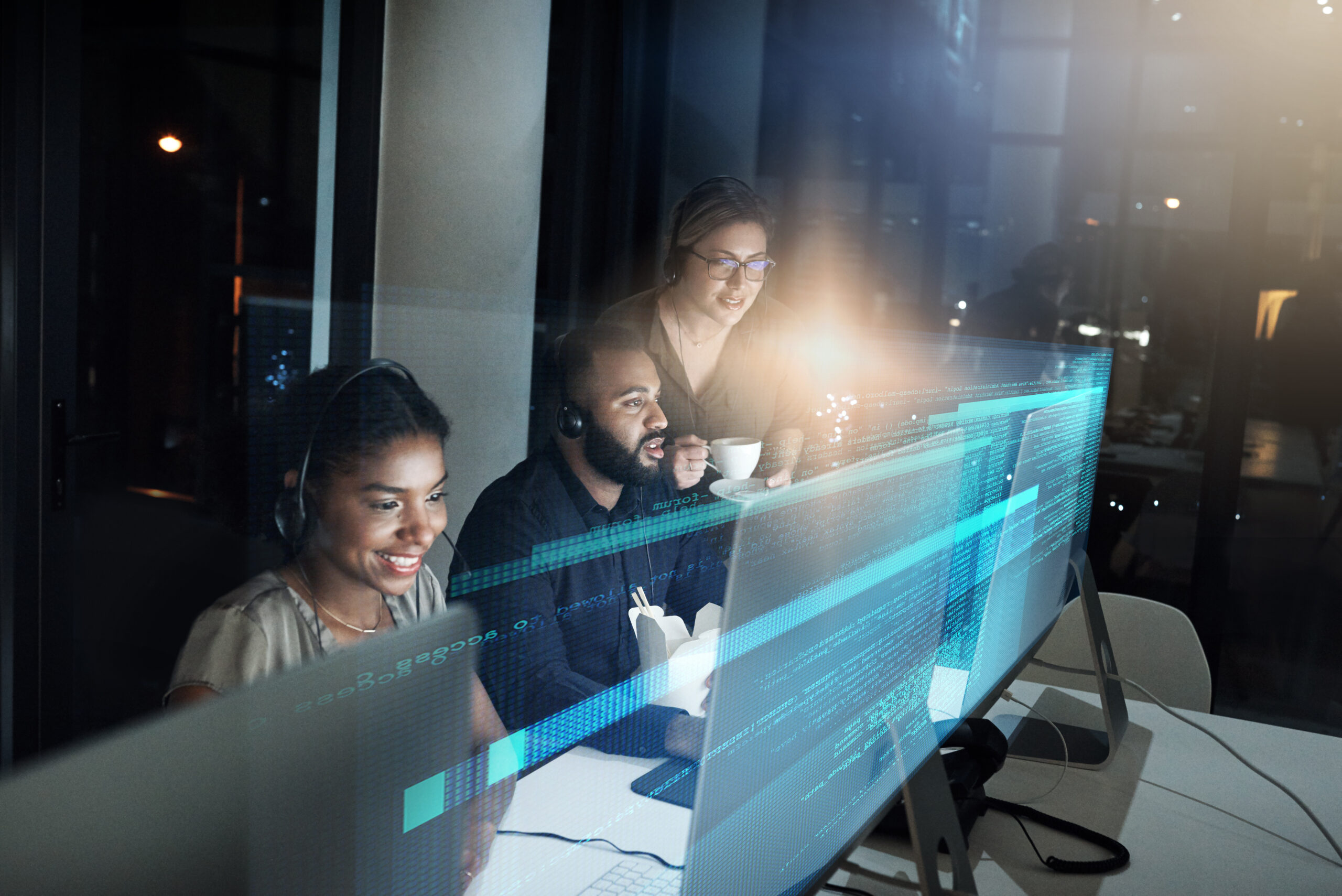 High angle shot of an IT support team working the late shift in their office